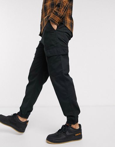 Pantaloni cargo neri con fondo elasticizzato - New Look - Modalova