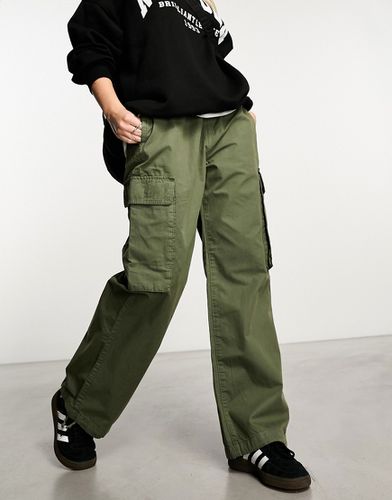 Pantaloni cargo slim con doppia tasca color kaki - New Look - Modalova