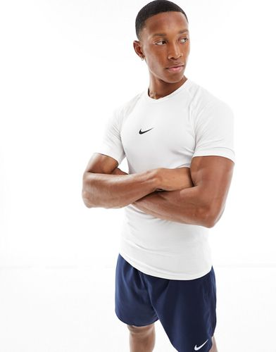 Nike Pro Training - T-shirt attillata bianca - Nike Training - Modalova