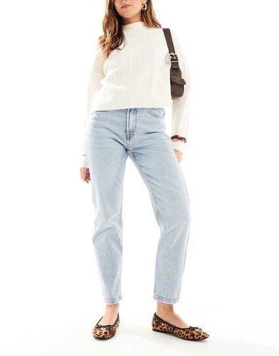 Mom jeans slim elasticizzati in cotone slavato - Stradivarius - Modalova