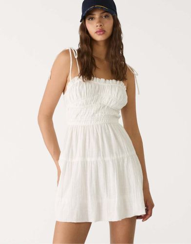 Robe courte et bouffante avec buste élastique - Écru - Stradivarius - Modalova