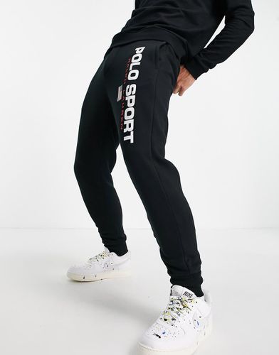 Sport Capsule - Joggers con fondo elasticizzato con strisce laterali e logo con bandiera in stile rétro, colore bianco/ - Polo Ralph Lauren - Modalova