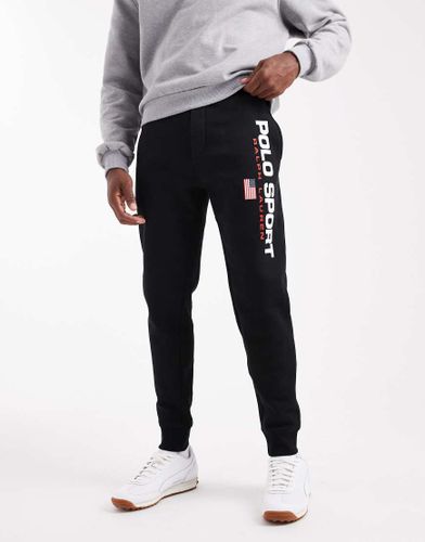 Sport Capsule - Pantalon de jogging resserré au chevilles en polaire avec logo drapeau - Polo Ralph Lauren - Modalova