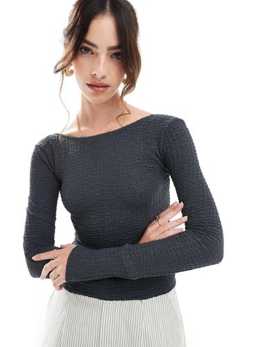 Top a maniche lunghe testurizzato aperto dietro - Pull & Bear - Modalova