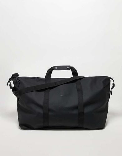 Hilo - Borsa weekend waterproof nera grande - Rains - Modalova