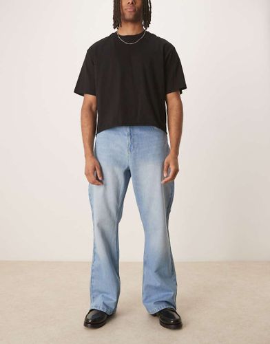 Jean bootcut évasé et décontracté en denim - clair délavé - Reclaimed Vintage - Modalova