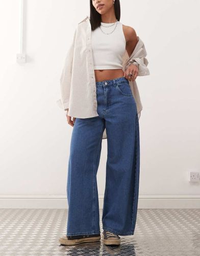 Jean large en denim - moyen délavé - Reclaimed Vintage - Modalova