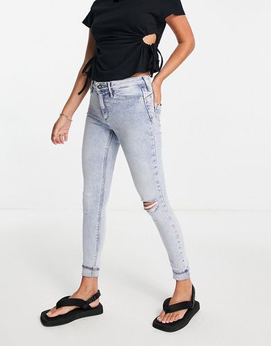 Molly - Jeans skinny modellanti azzurri con strappo - River Island - Modalova