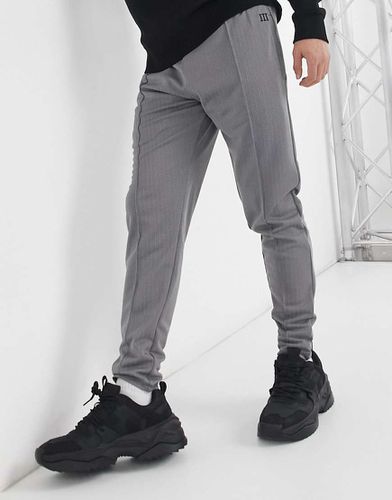 Joggers neri con motivo a spina di pesce - River Island - Modalova