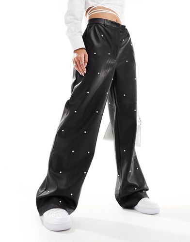 Pantaloni in similpelle PU neri con finiture con perle - River Island - Modalova