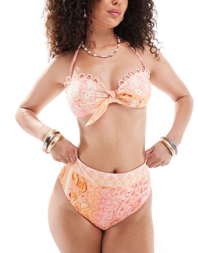 Top bikini a fascia annodato con stampa cachemire - River Island - Modalova