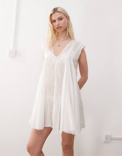 Robe courte et fluide en mousseline transparente - Weekday - Modalova