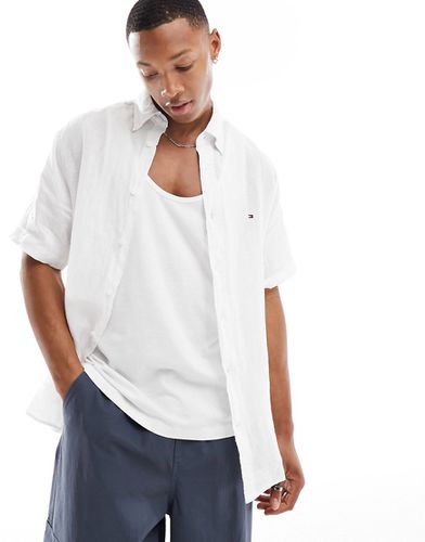 Camicia regular fit in lino bianca tinta unita pigmentata - Tommy Hilfiger - Modalova
