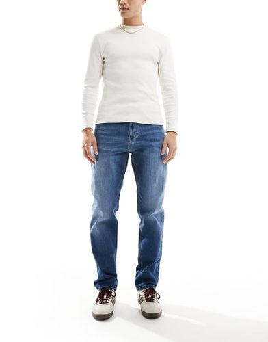 Ryan - Jeans dritti regular fit lavaggio medio - Tommy Jeans - Modalova