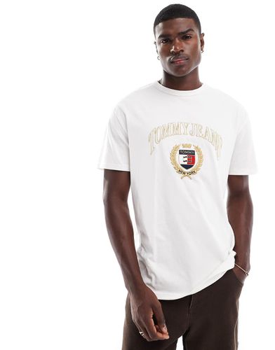 T-shirt sporco con stemma e logo oro - Tommy Jeans - Modalova