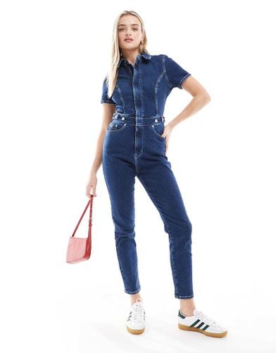 Tuta jumpsuit skinny in denim lavaggio medio - Tommy Jeans - Modalova