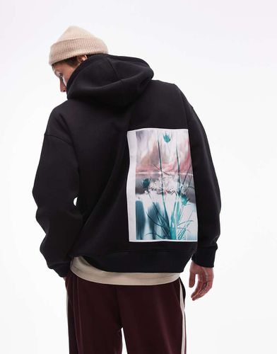 Felpa oversize nera con cappuccio e stampa di fiori sul davanti e sul retro - Topman - Modalova