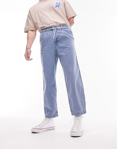 Jeans affusolati con pieghe sul davanti lavaggio medio - Topman - Modalova