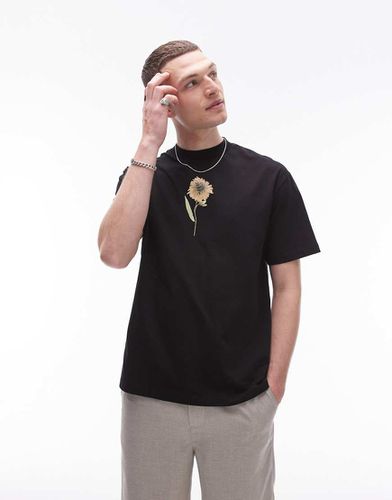 T-shirt oversize nera con stampa di fiore pressato sul petto - Topman - Modalova