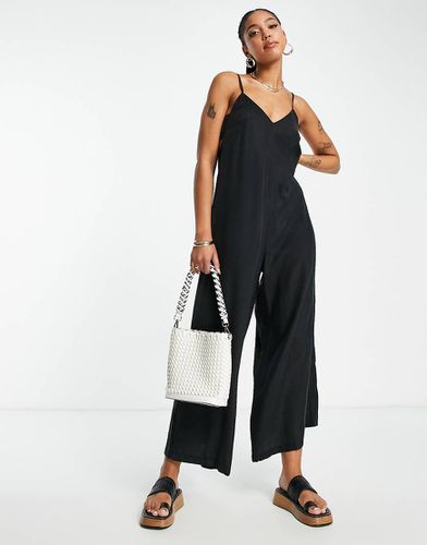 Tuta jumpsuit a fondo ampio con spalline sottili e apertura sul retro nera - Topshop - Modalova