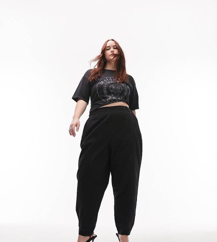 Curve - Pantaloni a vita alta slavato con gamba a palloncino e pinces - Topshop - Modalova