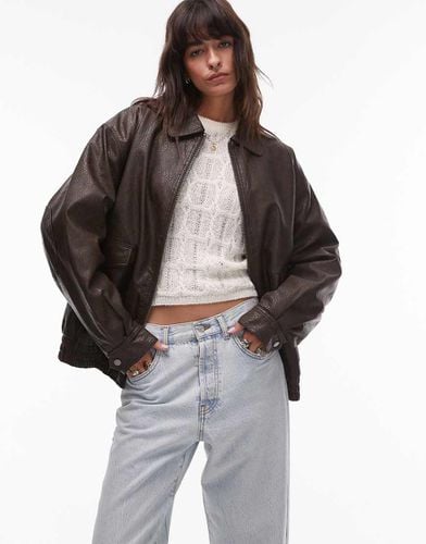 Giacca bomber oversize in pelle sintetica zigrinata con colletto - Topshop - Modalova