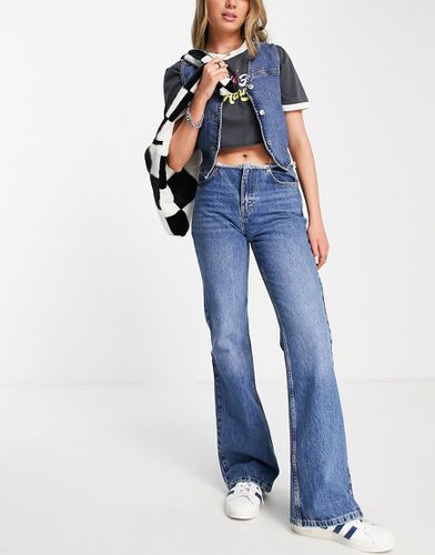Jeans a zampa anni '90 medio con vita grezza - Topshop - Modalova