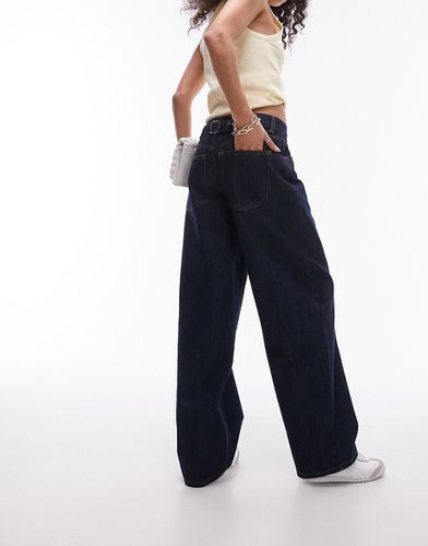 Jeans grezzi indaco a vita bassa con cinturino sul retro - Topshop - Modalova