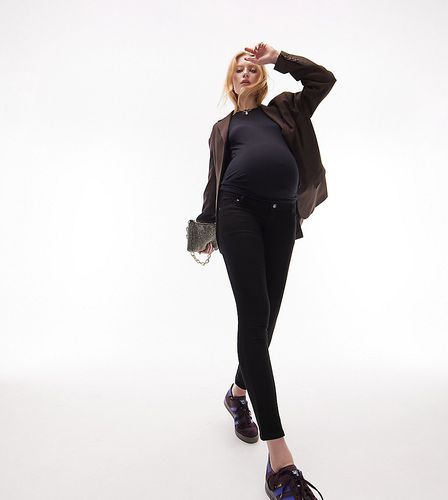 Leigh - Jeans neri con fascia per il pancione - Topshop Maternity - Modalova