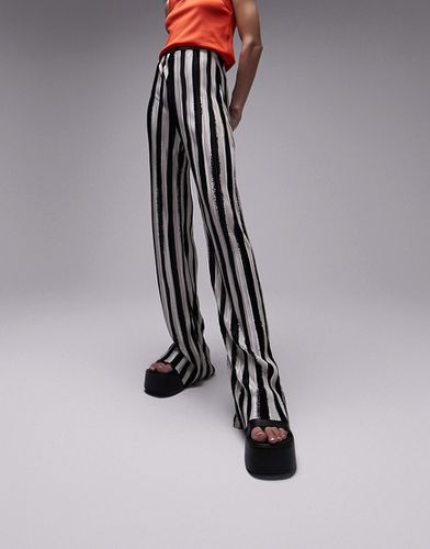 Pantaloni a fondo ampio plissé con stampa a righe monocromatiche - Topshop - Modalova