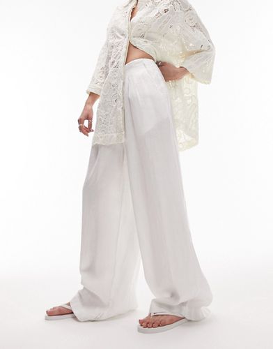 Pantaloni a fondo super ampio a pieghe bianchi in lino - Topshop - Modalova