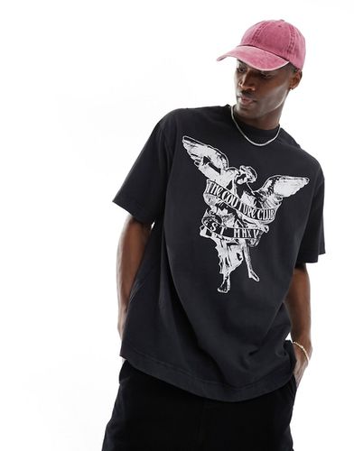 T-shirt nera con angelo sul davanti - The Couture Club - Modalova