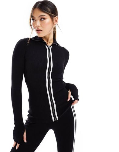 Ski - Leggings di un set con top con zip in maglia nera con dettagli bianchi a contrasto - Threadbare - Modalova