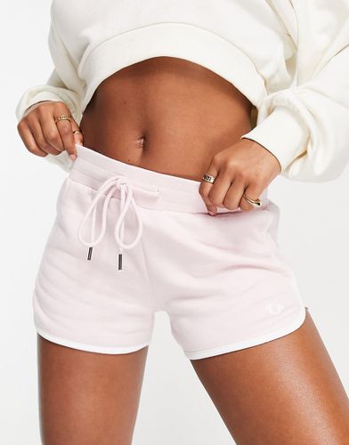 Pantaloncini della tuta rosa pallido con logo floccato - True Religion - Modalova