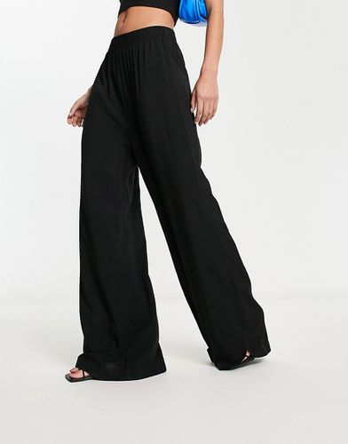 Pantaloni elasticizzati a fondo ampio neri - Urban Classics - Modalova