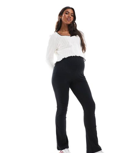 Leggings a zampa neri a coste con fascia per il pancione - Vero Moda Maternity - Modalova