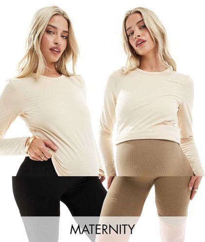 Pantaloncini leggings beige e neri senza cuciture con fascia sopra il pancione - Vero Moda Maternity - Modalova