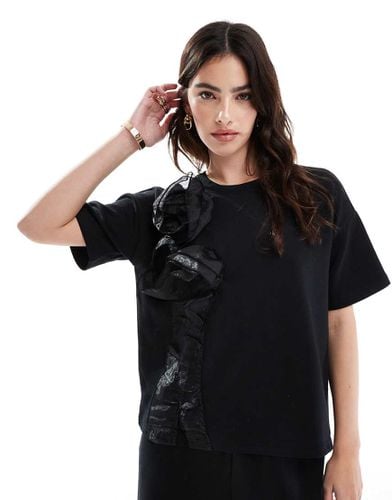 T-shirt felpata a maniche corte nera con rosa 3D applicata in coordinato - Vero Moda - Modalova