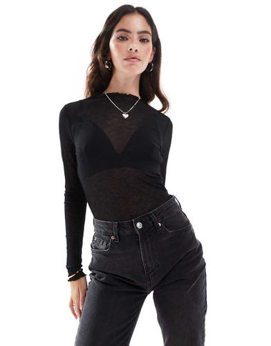 Top in jersey sottile a maniche lunghe con bordi smerlati - Vero Moda - Modalova