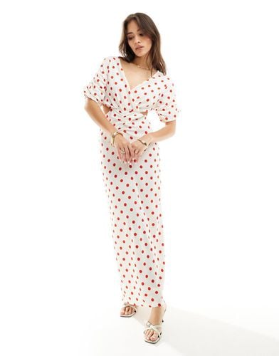 Vestito lungo bianco e rosso a pois con cut-out laterali e maniche a sbuffo - YAS - Modalova