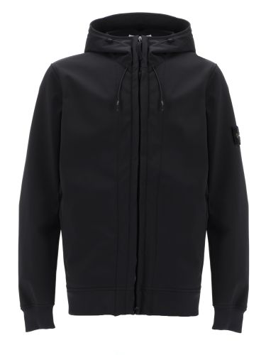 Giacca "biker" con cappuccio e zip - stone island - Modalova