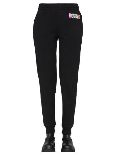 Jogging pants with logo print - moschino - Modalova