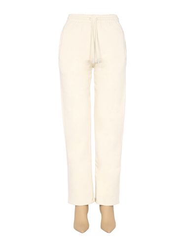 Off- "rubber arrow" jogging pants - off-white - Modalova