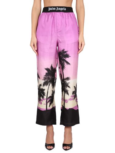 Palm angels pants with sunset print - palm angels - Modalova