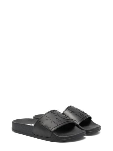 Pool slides embossed maxi logo - mm6 maison margiela - Modalova