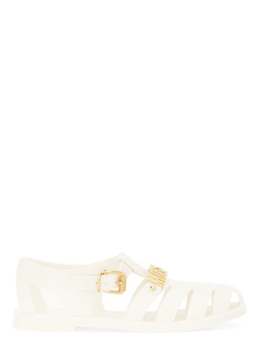 Jelly sandal with lettering logo - moschino - Modalova