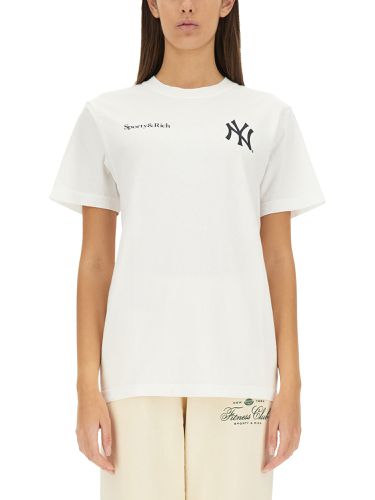 Sporty & rich t-shirt with logo - sporty & rich - Modalova