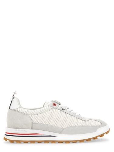 Low-top panelled sneaker - thom browne - Modalova