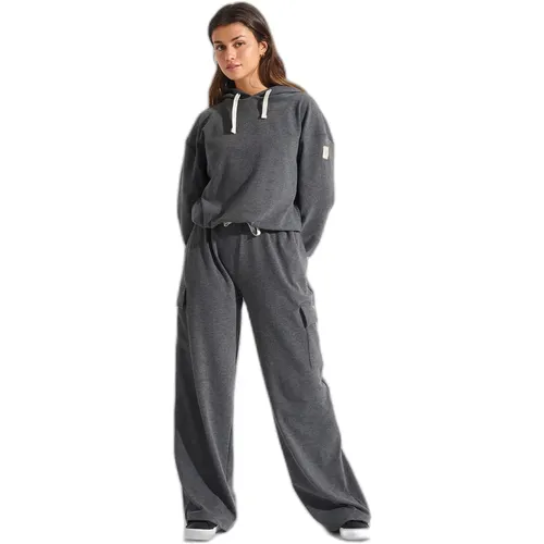 Details: • Weite Cargo-Jogginghose• Ultraweiches Material• Gefühl einer zweiten Haut• Elastikbund• Gerade Schnitt: Graue anthrazitfarbene H - MAG9445574 - Modalova