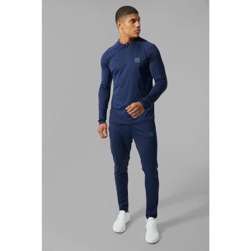 Tuta sportiva Man Active Skinny Fit a girocollo con zip corta - boohoo - Modalova